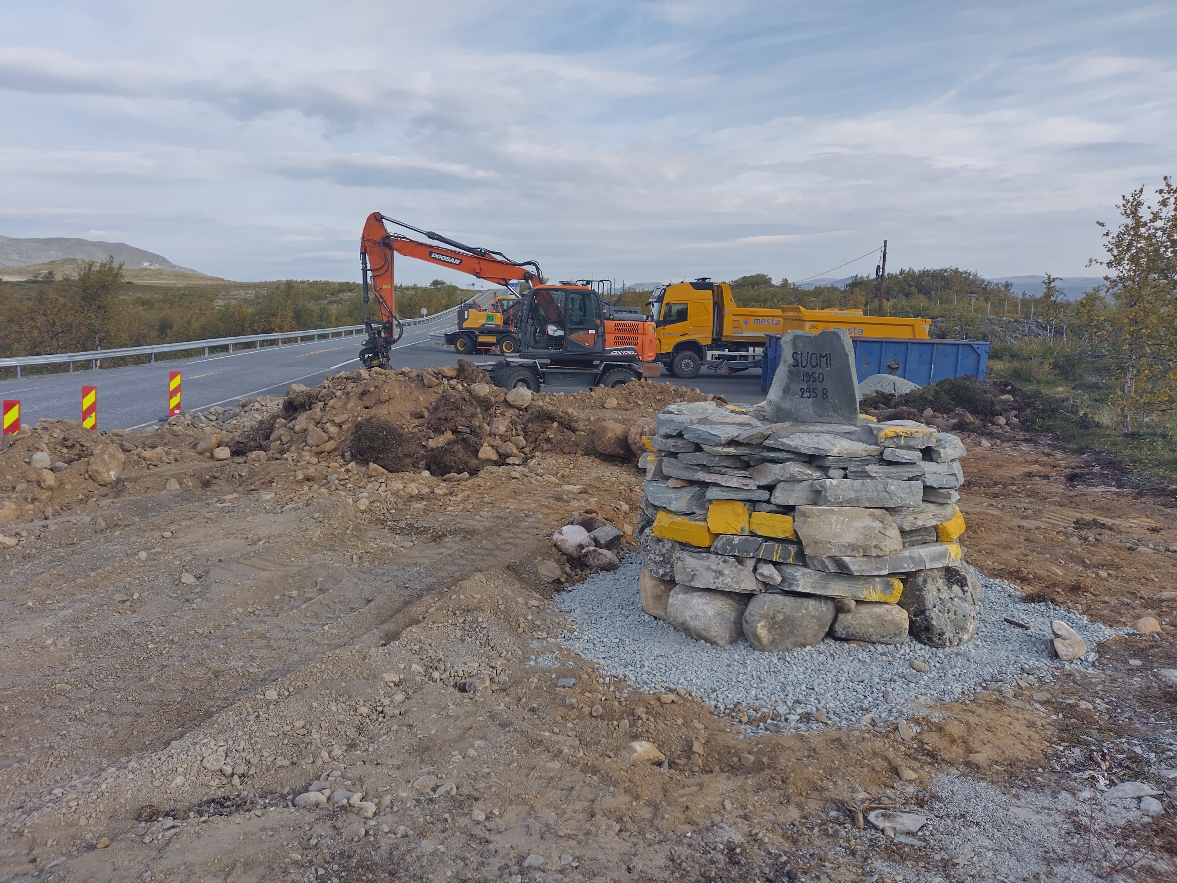 The picture shows a border marker, behind which you can see equipment that can be used to move it.