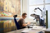 Surveyor at work in the office.